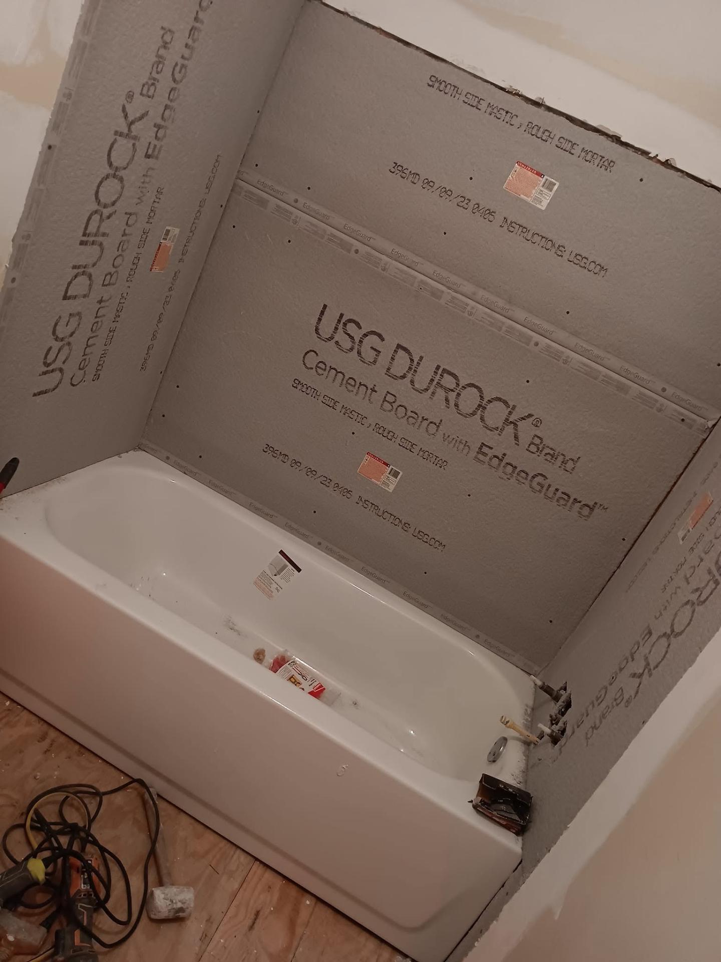 Bathtub surround framed in cement board ready for tile